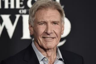 FILE - Harrison Ford attends the premiere of "The Call of the Wild" in Los Angeles on Feb. 13, 2020. Ford is taking a hiatus from filming “Indiana Jones 5” after sustaining an injury on set. The 78-year-old was hurt rehearsing a fight scene, a spokesperson for the Walt Disney Co. said Wednesday. (Photo by Richard Shotwell/Invision/AP, File)