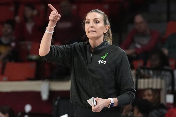FILE - TCU head coach Raegan Pebley gestures in the second half of an NCAA college basketball game against Oklahoma, Tuesday, Jan. 31, 2023, in Norman, Okla. The Los Angeles Sparks on Friday, Jan. 5, 2024, hired Pebley as general manager, replacing Karen Bryant who will focus solely on the team鈥檚 business operations. (APPhoto/Sue Ogrocki, File)