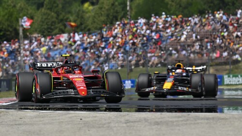 Spanish Formula One driver Carlos Sainz of Scuderia Ferrari, left, steers his car followed by Dutch Formula One driver Max Verstappen of Red Bull Racing during the third free practice ahead of Sunday's Formula One Hungarian Grand Prix auto race, at the Hungaroring racetrack in Mogyorod, near Budapest, Hungary, Saturday, July 22, 2023. (AP Photo/Denes Erdos)