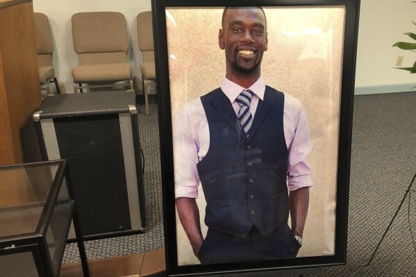 A portrait of Tyre Nichols is displayed at a memorial service for him on Tuesday, Jan. 17, 2023 in Memphis, Tenn. Nichols was killed during a traffic stop with Memphis Police on Jan. 7. (AP Photo/Adrian Sainz, File