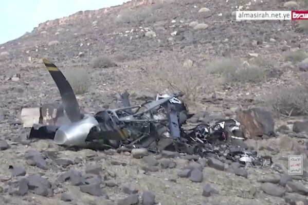 This still image from video provided by ALMasirah TV shows wreckage from unmanned aircraft in Yemen, on Saturday, April 27, 2024. Yemen’s Houthi rebels have claimed shooting down another of the U.S. military’s drones. They aired footage Saturday of parts that corresponded to known pieces of the unmanned aircraft. The U.S. military acknowledged to The Associated Press that “a U.S. Air Force MQ-9 drone crashed in Yemen.” It said an investigation is underway. ( ALMasirah TV via AP)