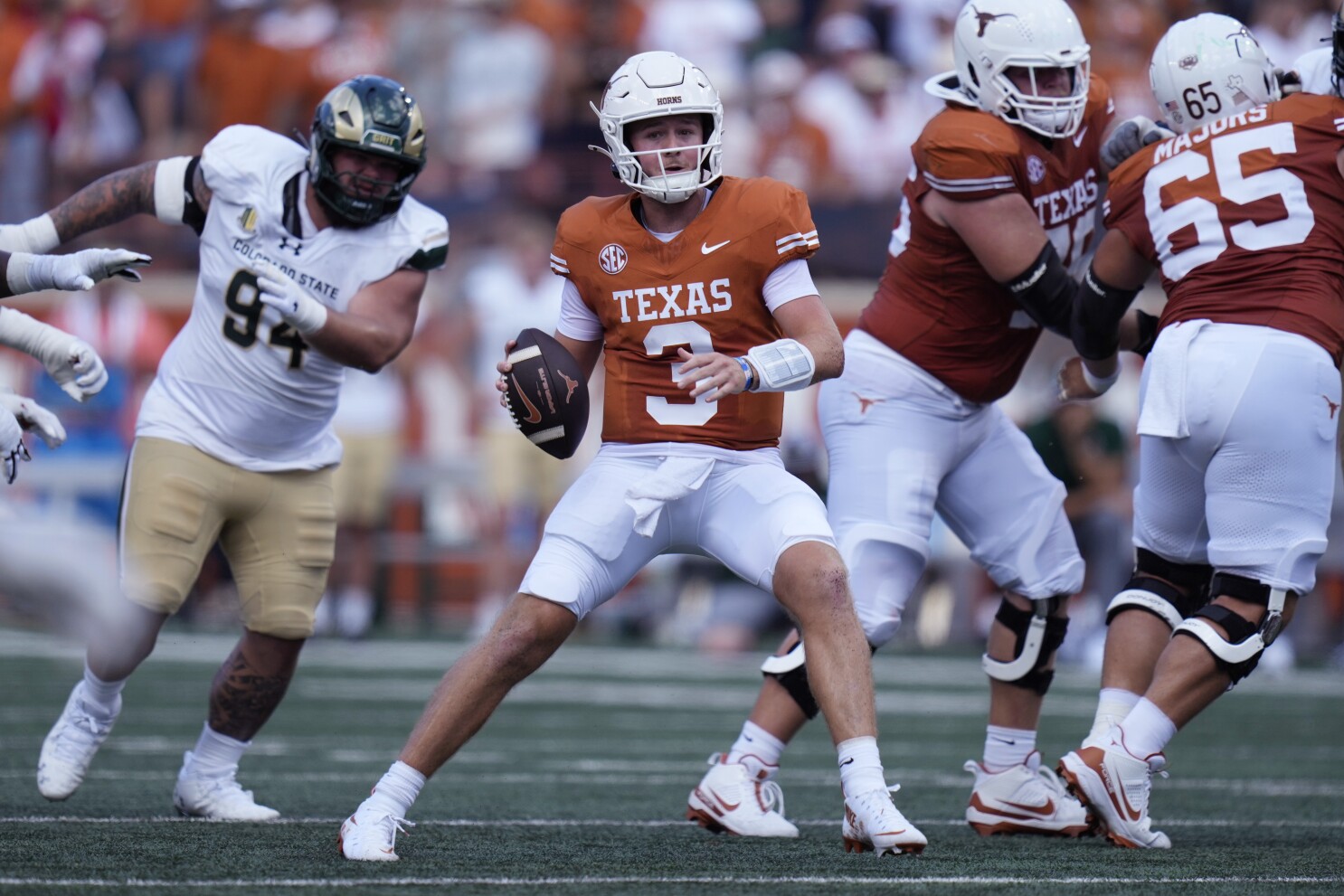 Ewers throws 3 TD passes to help No. 4 Texas roll over Colorado State 52-0 in opener