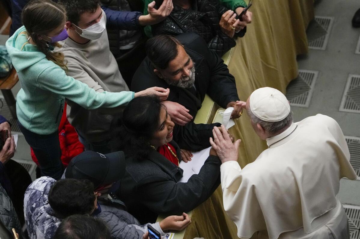 Pope Francis Kisses Ukrainian Flag From Martyred Bucha Ap News 