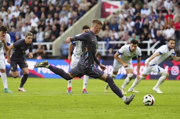 England's Cole Palmer scores during an international friendly soccer match between England and Bosnia and Herzegovina at St. James Park in Newcastle, England, Monday, June 3, 2024. (Mike Egerton/PA via AP)