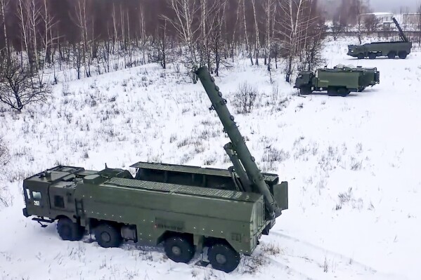 FILE - In this photo taken from video provided by the Russian Defense Ministry Press Service on Tuesday, Jan. 25, 2022, The Russian army's Iskander missile launchers take positions during drills in Russia. The Russian Defense Ministry said that the military will hold drills involving tactical nuclear weapons – the first time such exercise was publicly announced by Moscow. (Russian Defense Ministry Press Service via AP, File)