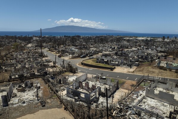 FILE- A general view shows the aftermath of a devastating wildfire in Lahaina, Hawaii, Tuesday, Aug. 22, 2023. During the deadliest U.S. wildfire in more than a century, a developer of land around a threatened Maui community urgently asked state officials for permission to divert stream water to help fight the growing inferno. (AP Photo/Jae C. Hong, File)