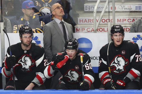 Buffalo Sabres coach Don Granato looks up during the third period of the team's NHL hockey game against the Columbus Blue Jackets on Tuesday, Dec. 19, 2023, in Buffalo, N.Y. (AP Photo/Jeffrey T. Barnes)