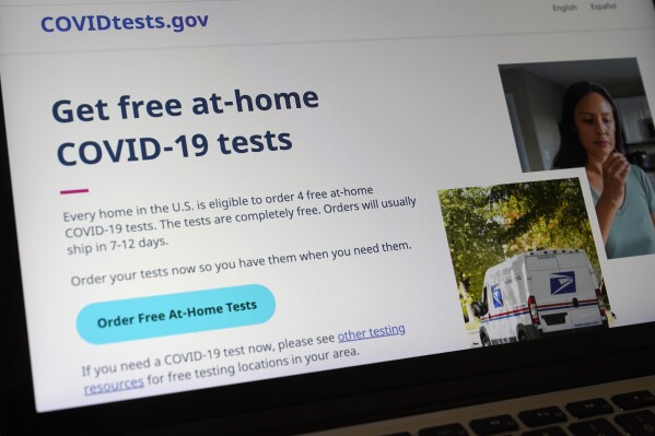 FILE - A United States government website is displayed on a computer, Wednesday, Jan. 19, 2022, in Walpole, Mass., that features a page where people can order free, at-home COVID-19 tests. The U.S. government is suspending mail orders for free COVID-19 tests, Friday, March 8, 2024. (AP Photo/Steven Senne, File)
