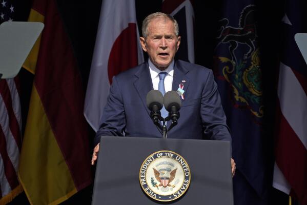 FILE - In this Sept. 11, 2021, file photo former President George W. Bush speaks at the Flight 93 National Memorial in Shanksville, Pa., on the 20th anniversary of the Sept. 11, 2001 attacks. Bush will headline a fundraiser for top Donald Trump critic Liz Cheney next month, turning her reelection race into a proxy war of sorts between the ex-presidents. Bush will be headlining the event in Dallas in October for the Wyoming congresswoman’s reelection campaign. (AP Photo/Gene J. Puskar, File)