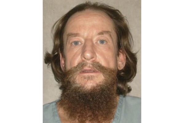 FILE - This undated file photo provided by the Oklahoma Department of corrections shows James Chandler Ryder, whose scheduled execution next month has been paused for 100 days so that a hearing can be held to determine if he's competent enough to be executed. The Oklahoma Court of Criminal Appeals issued the stay of execution on Dec. 22, 2023, Ryder was scheduled to receive a lethal injection on Feb. 1, 2024, for his role in the 1999 slayings of a mother and son in Pittsburg County following a property dispute. (Oklahoma Department of Corrections via AP, File)
