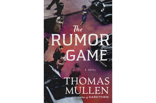 This cover image released by Minotaur shows "The Rumor Game" by Thomas Mullen. (Minotaur via AP)