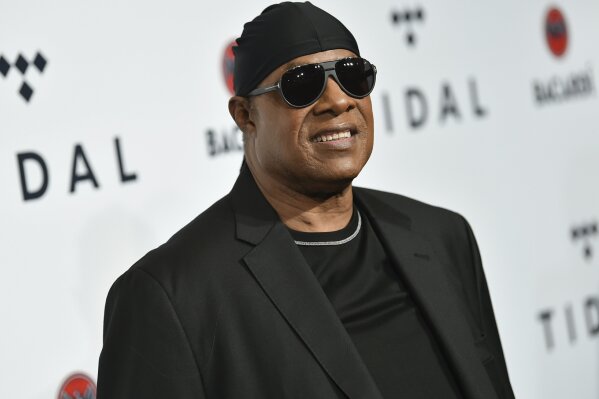 FILE - In this Oct. 17, 2017, file photo, Stevie Wonder attends the TIDAL X: Brooklyn 3rd Annual Benefit Concert in New York.  Wonder on Tuesday, Feb. 9, 2021,  was awarded Israel's Wolf Prize, headlining a group of laureates in the arts and sciences receiving the prestigious recognition.  He was recognized for “his tremendous contribution to music and society enriching the lives of entire generations of music lovers,” according to a statement from President Reuven Rivlin's office (Photo by Evan Agostini/Invision/AP, File)