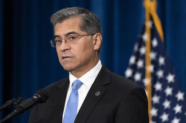 FILE - Health and Human Services Secretary Xavier Becerra speaks during a news conference at the HHS Humphrey Building, Oct. 18, 2022, in Washington. The Biden administration said Monday, Feb. 27, 2023, that it is creating a new task force to crack down on an explosion of migrant children in the U.S. who are being illegally exploited for labor. (AP Photo/Jacquelyn Martin, File)