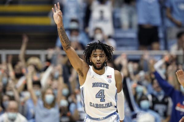 North Carolina guard R.J. Davis (4) reacts following a 3-point basket against Brown during the second half of an NCAA college basketball game in Chapel Hill, N.C., Friday, Nov. 12, 2021. (AP Photo/Gerry Broome)