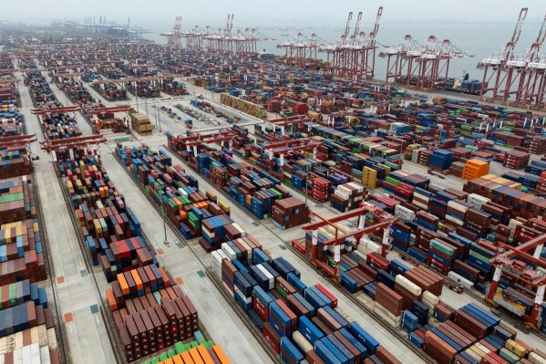 Shipping containers are seen ready for transport at the Guangzhou Port in the Nansha district in southern China's Guangdong province on Thursday, April 17, 2025. (AP Photo/Ng Han Guan)
