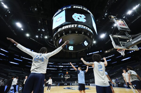 North Carolina players warm up during practice ahead of their Sweet Sixteen college basketball game in the NCAA tournament Wednesday, March 27, 2024, in Los Angeles. North Carolina plays Alabama Thursday. (AP Photo/Ashley Landis)