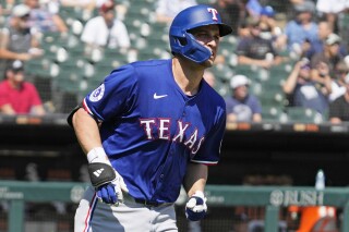 Rangers All-Star Corey Seager to have sports hernia surgery, ending season  | AP News