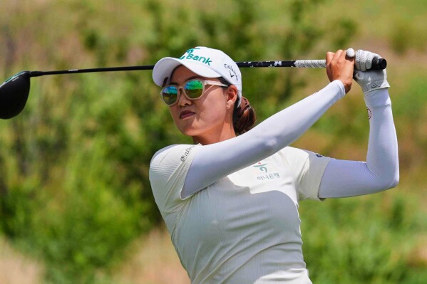 Minjee Lee hits a tee shot on the second hole during the third round of the Women's PGA Championship golf tournament Saturday, June 21, 2025, in Frisco, Texas. (AP Photo/LM Otero)