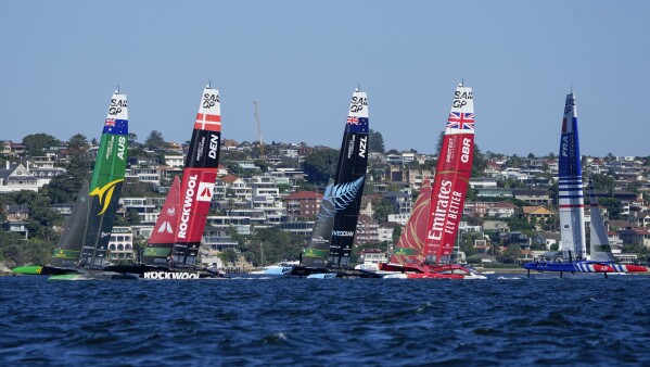 Boats start in a race two of the SailGP series on Sydney Harbour, Sydney, Australia, Sunday, Feb. 25, 2024. (AP Photo/Mark Baker)