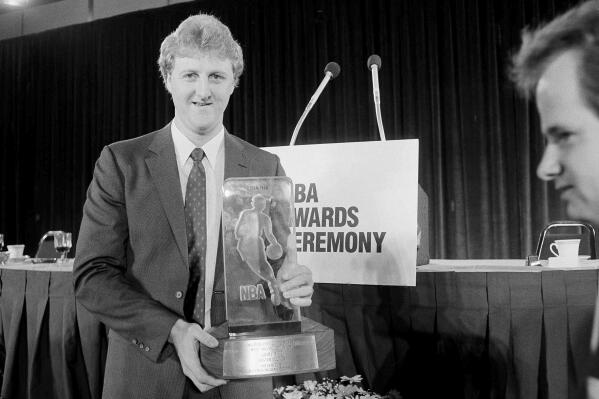 FILE - Boston Celtics' Larry Bird receives NBA's Most Valuable Player of the Year award during the NBA's award ceremony in San Francisco on June 23, 1985. (AP Photo/Paul Sakuma, File)