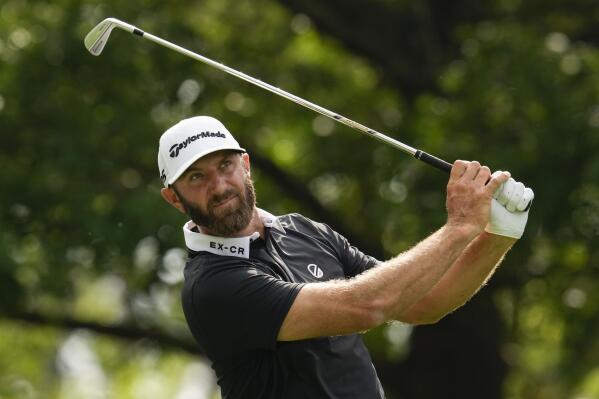 Dustin Johnson watches his tee shot on the fourth hole during the second round of the Masters golf tournament at Augusta National Golf Club on Friday, April 7, 2023, in Augusta, Ga. (AP Photo/Mark Baker)