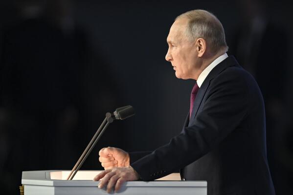 Russian President Vladimir Putin gives his annual state of the nation address in Moscow, Russia, Tuesday, Feb. 21, 2023. (Maxim Blinov, Sputnik, Kremlin Pool Photo via AP)