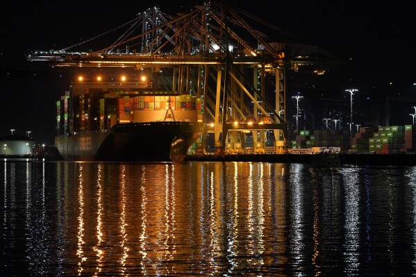 File - The container ship Ever Libra (TW) is moored at the Port of Los Angeles on Nov. 21, 2022. On Thursday, the Commerce Department issues its third and final estimate of how the U.S. economy performed in the second quarter of 2023. (AP Photo/Damian Dovarganes, File)