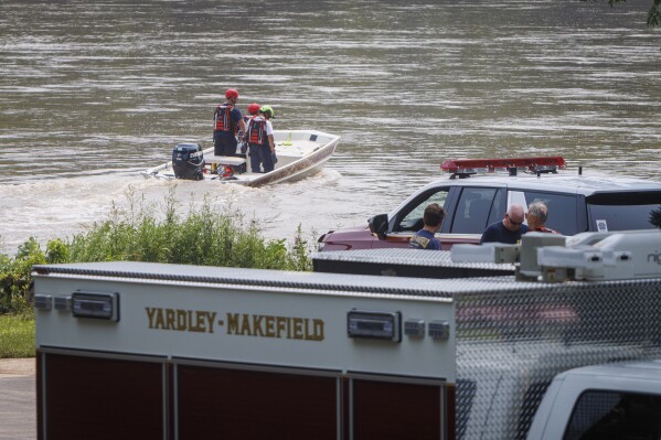 Yardley Makefield Marine Rescue leaving the Yardley Boat Ramp along N. River Road heading down the Delaware River on Monday morning July 17, 2023, in Yardley, Pa. Search and rescue units are looking for two lost children caught in flood waters Saturday. (Alejandro A. Alvarez/The Philadelphia Inquirer via AP)