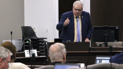 FILE - State Rep. John Torbett, R-Gaston County, answers questions about his bill to limit how teachers can discuss certain racial topics during a House Education Committee meeting at the Legislative Office Building in Raleigh, N.C., March 14, 2023. As the North Carolina legislative session winds down for the summer and budget negotiations plod along, House Republicans are proposing an eleventh-hour overhaul of public education laws that would take power away from superintendents and the State Board of Education while giving parents and lawmakers more control. (AP Photo/Hannah Schoenbaum, File)