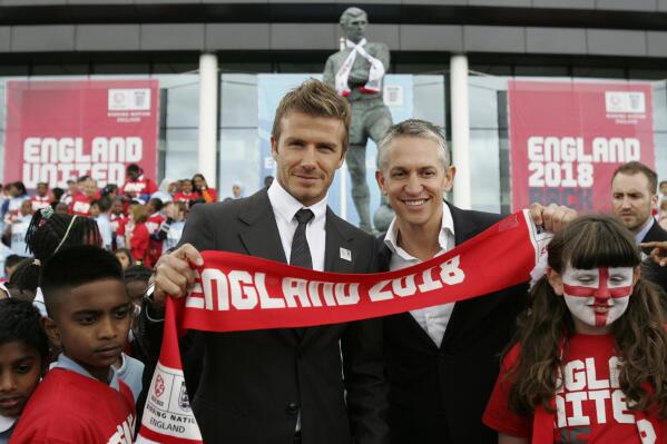 FILE - English soccer star David Beckham, left and former England striker Gary Lineker at the launch campaign to bid for the soccer World Cup to be held in England in 2018 or 2022 at Wembley Stadium, London, May 18, 2009. Gary Lineker will return to airwaves after the BBC reversed the former soccer great's suspension on Monday, March 13, 2023 for a post on Twitter that had criticized the British government’s new asylum policy. (AP Photo/Alastair Grant, file)