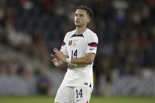 FILE - United States' Djordje Mihailovic stands on the field during the second half of a CONCACAF Gold Cup soccer match against St. Kitts & Nevis, June 28, 2023, in St. Louis. Mihailovic joined the Colorado Rapids on Monday, Jan. 8, 2024 returning to Major League Soccer after scoring just one goal during 23 league appearances during a year with AZ Alkmaar in the Dutch Erevisie. (AP Photo/Jeff Roberson, file)