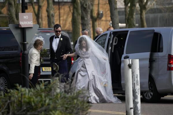 Stella Moris arrives to marry her partner the WikiLeaks founder Julian Assange in a small wedding service to be held inside the high-security Belmarsh Prison, in south east London, Wednesday March 23, 2022. Assange, who is in a legal battle over a decision to extradite him to the U.S. to face spying charges, has been held at Belmarsh Prison since 2019, when he was arrested for skipping bail during a separate legal battle. Before that, he spent seven years inside the Ecuadorian Embassy in London to avoid extradition to Sweden to face allegations of rape and sexual assault. (AP Photo/Matt Dunham)