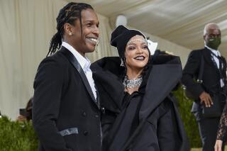 FILE - A$AP Rocky, left, and Rihanna attend The Metropolitan Museum of Art's Costume Institute benefit gala celebrating the opening of the "In America: A Lexicon of Fashion" exhibition in New York on Sept. 13, 2021. (Photo by Evan Agostini/Invision/AP, File)