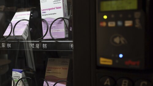 A vending machine is stocked with emergency contraceptives at Odegaard Library on the campus of the University of Washington, Friday, June 2, 2023, in Seattle. After a student-led campaign to install the emergency contraceptive vending machine on campus in November, boxes of generic Plan B have been available to students for $12.60, a fraction of the cost charged in stores. (Kevin Clark/The Seattle Times via AP)