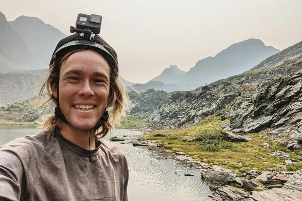 In this Sept. 12, 2020, photo provided by Jean Granberg, her son, Daniel Granberg poses for a selfie at the basin just south of Trinity and Storm King Peaks in Silverton, Colo. The body of the American man, who died while climbing one of Bolivia’s highest peaks, arrived Sunday, Sept. 5, 2021, in the country’s capital after a two-day recovery effort. Rescue workers said 24-year-old Granberg, of Colorado, died atop the Illimani mountain.  (Daniel Granberg/Courtesy of Granberg Family via AP)