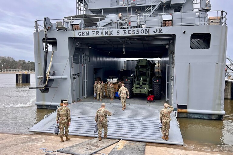 In this photo provided by U.S. military's Central Command, U.S. Army Vessel (USAV) General Frank S. Besson (LSV-1) from the 7th Transportation Brigade (Expeditionary), 3rd Expeditionary Sustainment Command, XVIII Airborne Corps, prepare to departs Joint Base Langley-Eustis, Va., Saturday, March 9, 2024, en route to the Eastern Mediterranean less than 36 hours after President Biden announced the U.S. would provide humanitarian assistance to Gaza by sea. (U.S. Central Command via AP)