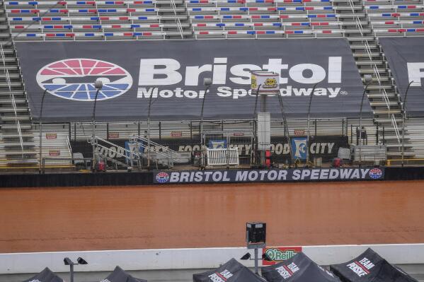 The dirt track is soaked at Bristol Motor Speedway where all NASCAR activities were canceled Friday, April 7, 2023, in Bristol, Tenn. (Emily Ball/Bristol Herald Courier via AP)