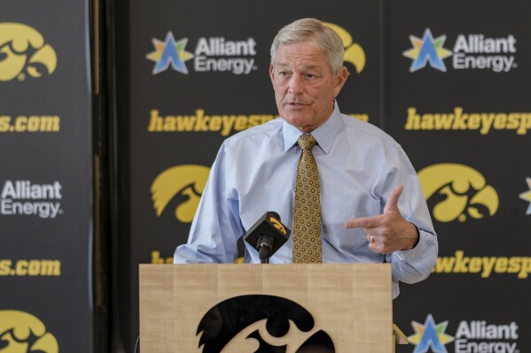 FILE - Iowa head coach Kirk Ferentz speaks during an NCAA college football press conference in Iowa City, Iowa, Tuesday, Nov. 14, 2023. Iowa has been known for stability on its football coaching staff, which makes this spring a little different for the Hawkeyes. (Nick Rohlman/The Gazette via AP, File)