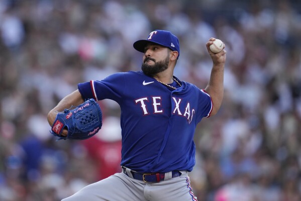 FILE - Texas Rangers starting pitcher Martin Perez works against a San Diego Padres batter during the fifth inning of a baseball game July 29, 2023, in San Diego. Perez agreed to terms on a one-year deal with the Pittsburgh Pirates, Monday, Dec. 18, 2023. (AP Photo/Gregory Bull, File)