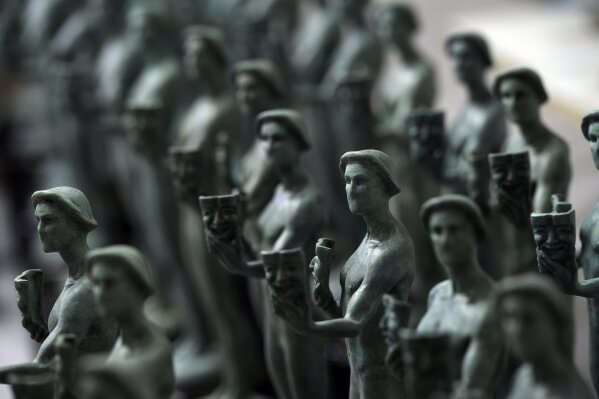 FILE - Finished Actor statuettes are displayed during the 25th annual Casting of the Screen Actors Guild Awards at American Fine Arts Foundry on Jan. 15, 2019, in Burbank, Calif. The SAG Awards announced Wednesday, Jan. 13, 2021, that the 27th annual ceremony has been moved to April 4. The awards had been originally scheduled to air March 14, but shifted to a different date to avoid conflict with the Grammys. (Photo by Chris Pizzello/Invision/AP, File)