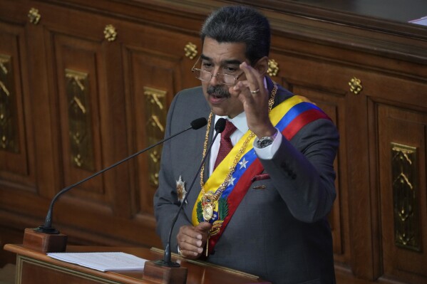 Venezuelan President Nicolas Maduro delivers his annual address at the National Assembly in Caracas, Venezuela, Monday, Jan. 15, 2024. (AP Photo/Ariana Cubillos)