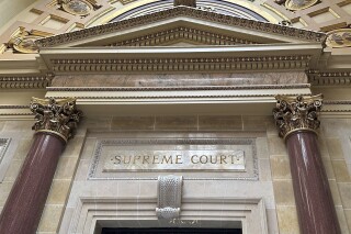 FILE - The entrance to the Wisconsin Supreme Court chambers is seen in the state Capitol in Madison, Wis. March 14, 2024. The Wisconsin Supreme Court will decide if counties must release voter incompetency records. The court issued a two-page order Tuesday afternoon, March 19, 2024, saying it would take the case. The order offered no other details beyond mandating that the first briefs be filed within 30 days. (AP Photo/Todd Richmond, File)