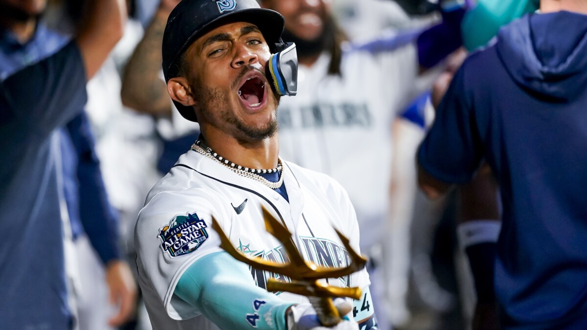 American League's Julio Rodríguez, of the Seattle Mariners, jogs off the  field during the MLB All-Star baseball game against the National League in  Seattle, Tuesday, July 11, 2023. (AP Photo/Lindsey Wasson Stock