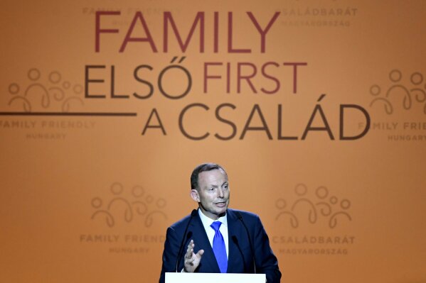 Former Prime Minister of Australia Tony Abbott delivers a speech during the 3rd Budapest Demographic Summit in Varkert Bazar conference center in Budapest, Hungary, Thursday, Sept. 5, 2019. The Hungarian capital city, which hosts the international summit for the third time after 2015 and 2017, welcomes politicians, scientists, church dignitaries and public personalities to give presentations and exchange their experiences on current population trends. (Szilard Koszticsak/MTI via AP)