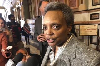 FILE - In this Nov. 12, 2019, file photo, Chicago Mayor Lori Lightfoot talks to reporters after meeting with House Democrats at the state Capitol, in Springfield, Ill. Lightfoot announced Wednesday, May 19, 2021, that she will grant one-on-one interviews to mark the two-year anniversary of her inauguration solely to journalists of color, saying she has been struck by the “overwhelming whiteness and maleness of Chicago media outlets.” (AP Photo/John O'Connor, File)