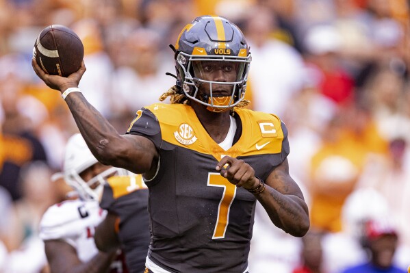 Tennessee quarterback Joe Milton III (7) throws to a receiver during the first half of an NCAA college football game against Austin Peay, Saturday, Sept. 9, 2023, in Knoxville, Tenn. (AP Photo/Wade Payne)