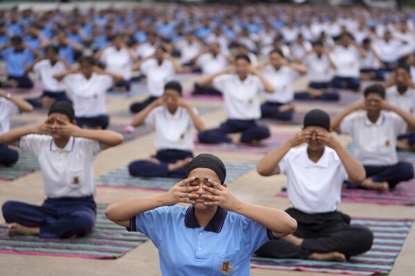 National Cadet Corps cadets practice Yoga ahead of International Day of Yoga in Ahmedabad, India, Friday, June 20, 2025. (AP Photo/Ajit Solanki)