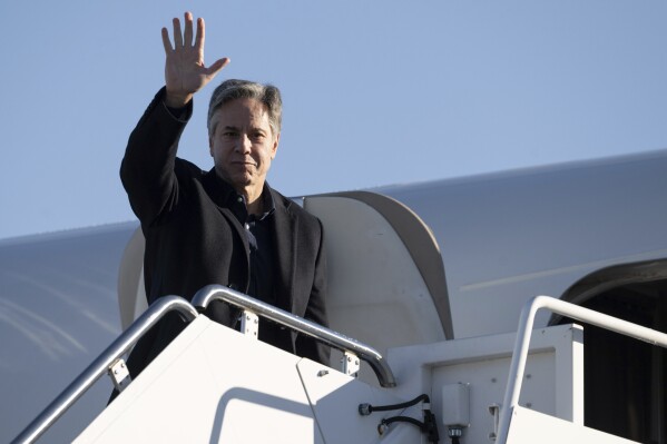 US Secretary of State Antony Blinken boards his aircraft prior to departure, Monday, Nov. 27, 2023, at Andrews Air Force Base, Md., as he travels to Brussels for a NATO Foreign Ministers meeting. (Saul Loeb/Pool via AP)