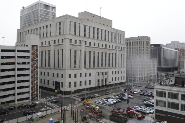 FILE - The Theodore Levin United States Courthouse is photographed in Detroit on July 11, 2011. An Indiana man accused of making a violent threat against a local election official in Michigan in 2020 pleaded guilty to the charge Tuesday, Feb. 27, 2024. Andrew Nickels of Carmel appeared in federal court on the day of Michigan's presidential primary. A voicemail was left on Nov. 10, 2020, a week after the last presidential election, threatening to kill a suburban Detroit clerk and accusing her of fraud, investigators said. (AP Photo/Carlos Osorio, file)