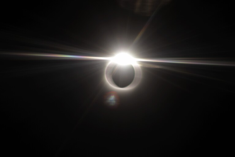 FILE - A total solar eclipse is seen from an aircraft over Patna, India, Wednesday, July 22, 2009. (AP Photo/Shreya Sahai, File)